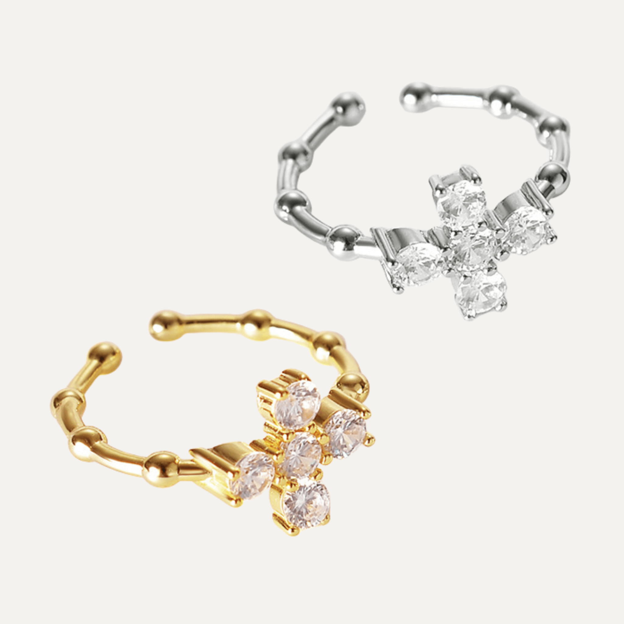 Bague croix Crux dorée et argentée avec zircons