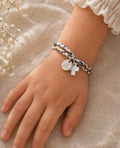 Bracelet avec médaille à graver et croix en nacre - Bijoux Croix